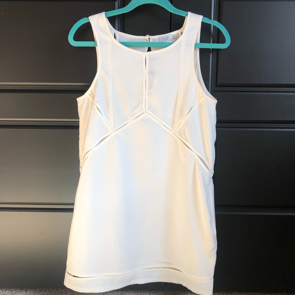 Tobi Dresses & Skirts - Cute White Dress with Pockets and Fun Cutouts!